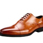 Détail du cuir de haute qualité des chaussures Oxford, mettant en avant la texture et la finition